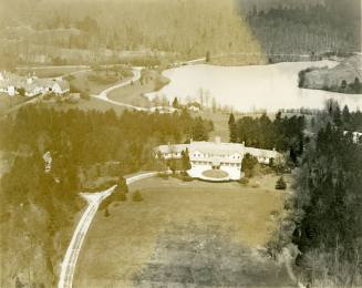 Aerial view of Reynolda estate including house and Lake Katharine