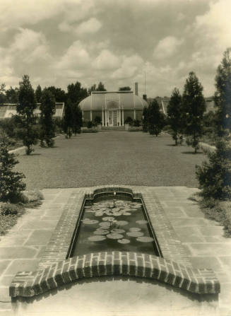 Central greenhouse with fountain in foreground