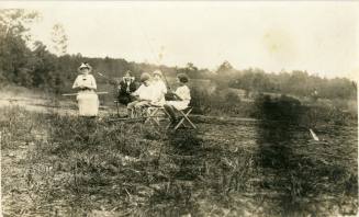 Katharine Reynolds fishing with children Dick, Nancy, and Mary Reynolds, circa 1915