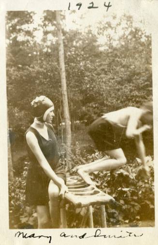 Mary watching Smith jump off diving board, 1924